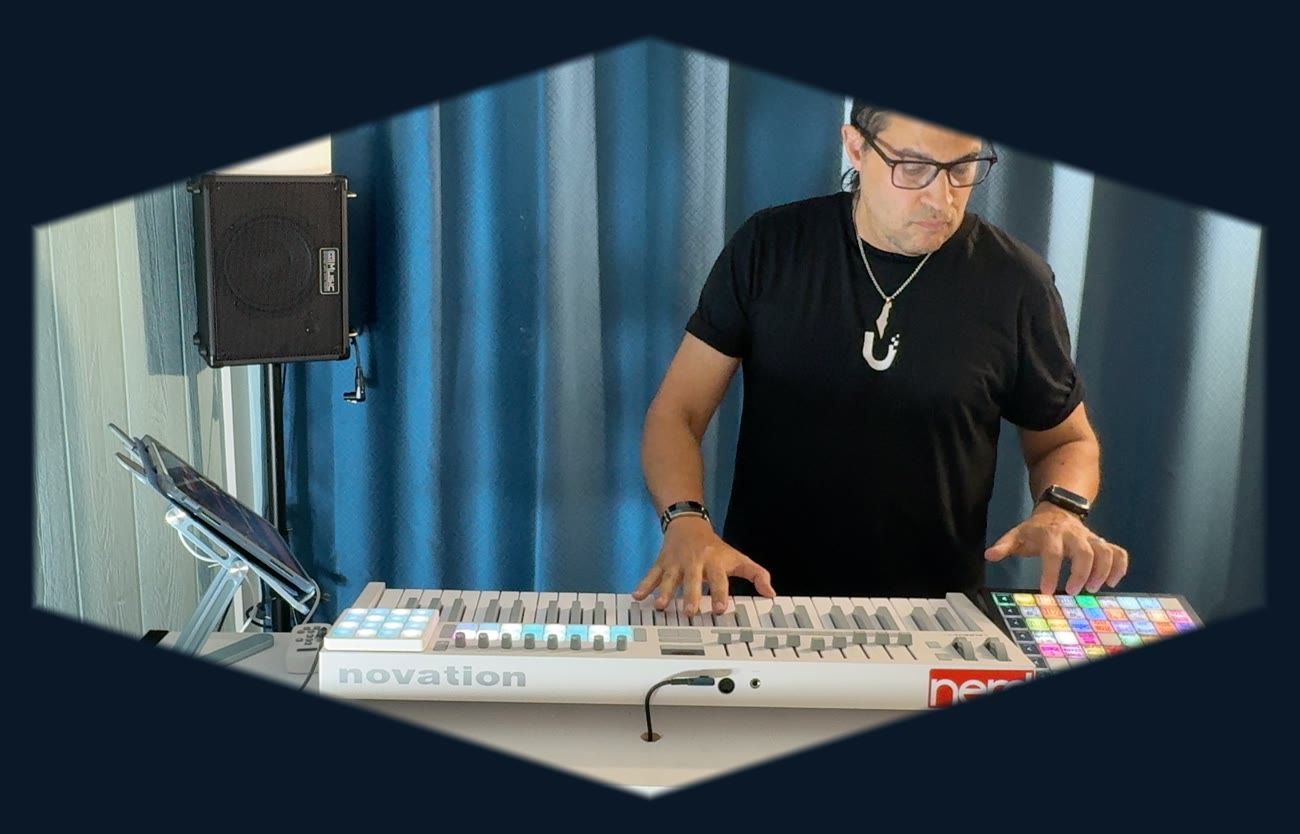 Performing on the full PianoHack rig — Launchkey, Launchpad and monitor in the studio